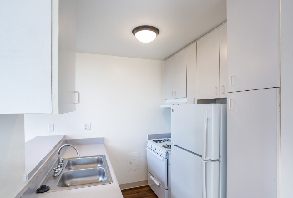 Windward Village Apartments unfurnished kitchen with appliances Windward Village Apartments unfurnished kitchen with appliances